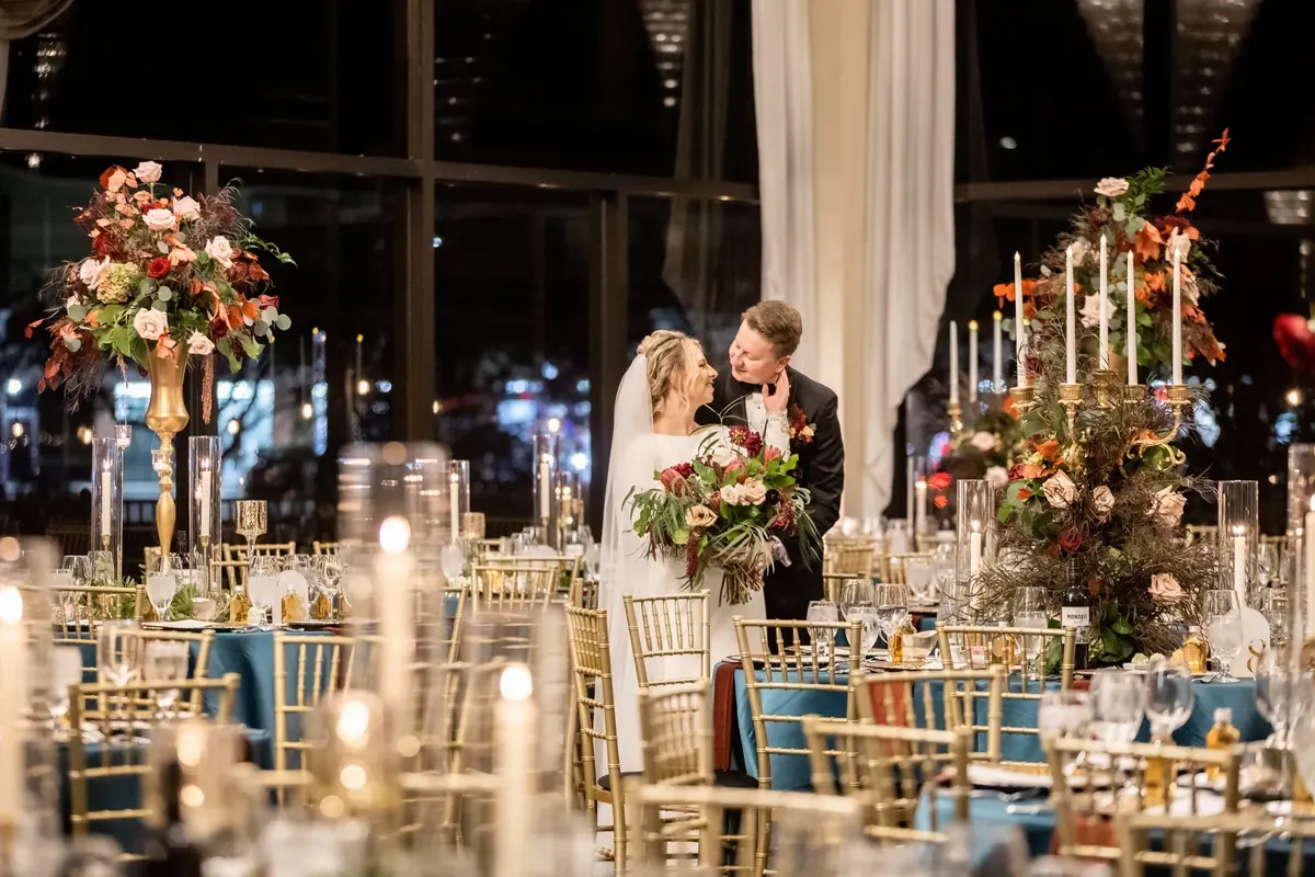 Candlelit reception with the couple by YJDecorating